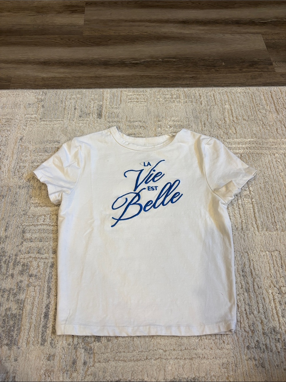 Mighty Fine White Tee with Blue Script "La Vie Est Belle"